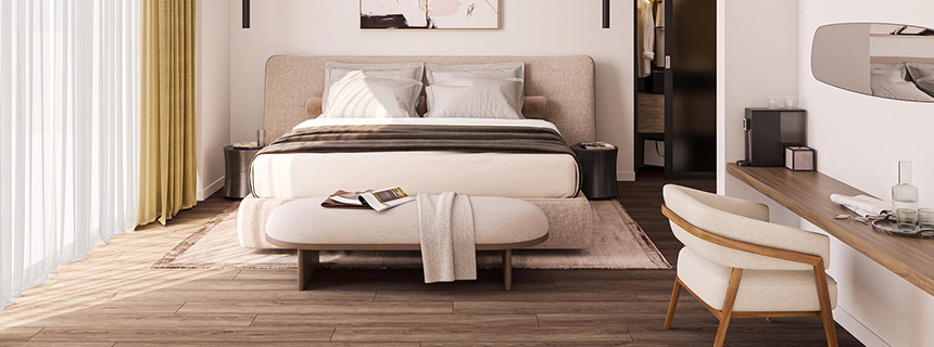 Camera da letto con pavimento laminato della Tarkett, essenza rovere antico.